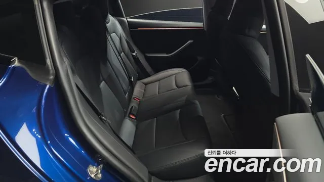 Tesla Model 3 — Фото автомобиля 11