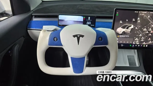Tesla Model Y — Фото автомобиля 18