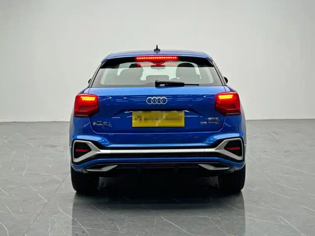 Audi Q2L — Фото автомобиля 5