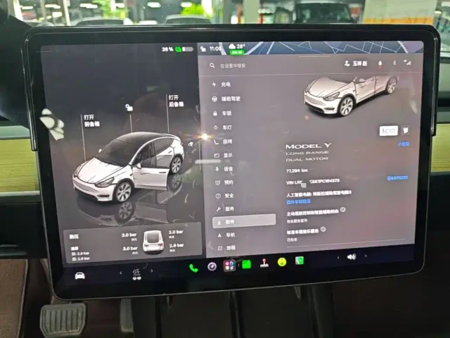 Tesla Model Y — Фото автомобиля 11