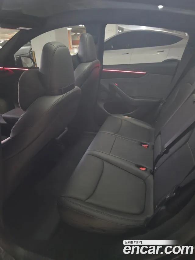 Tesla Model Y — Фото автомобиля 7