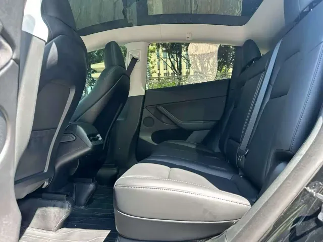 Tesla Model Y — Фото автомобиля 9