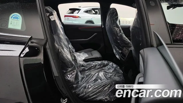 Tesla Model Y — Фото автомобиля 17