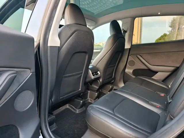 Tesla Model Y — Фото автомобиля 7