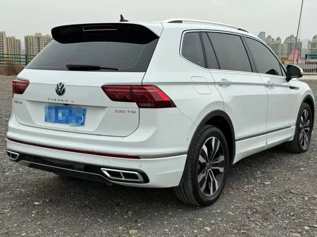 Volkswagen Tiguan L — Фото автомобиля 16