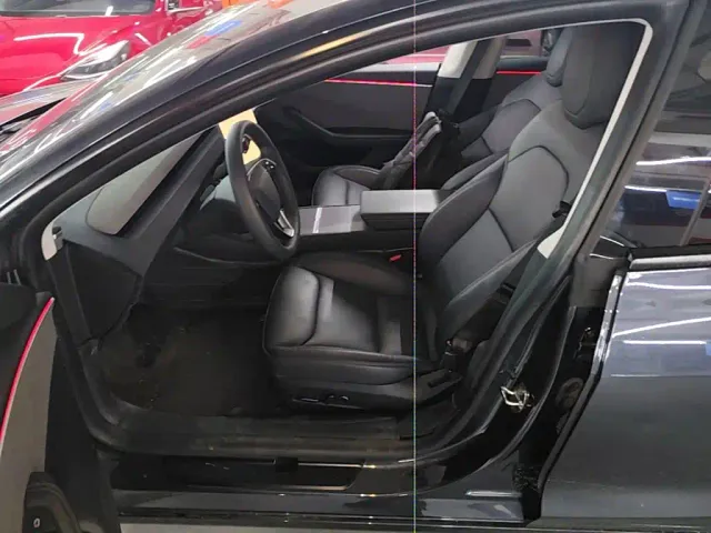 Tesla Model 3 — Фото автомобиля 15