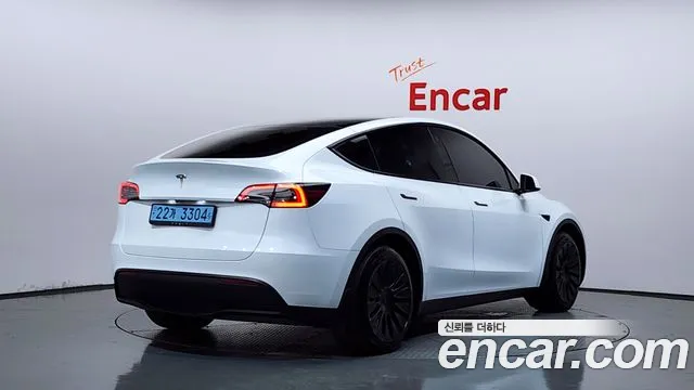 Tesla Model Y — Фото автомобиля 2