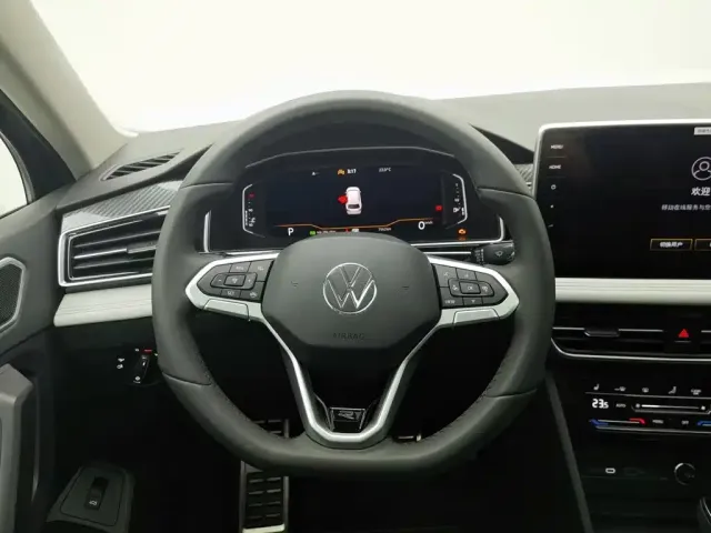 Volkswagen Tiguan L — Фото автомобиля 11
