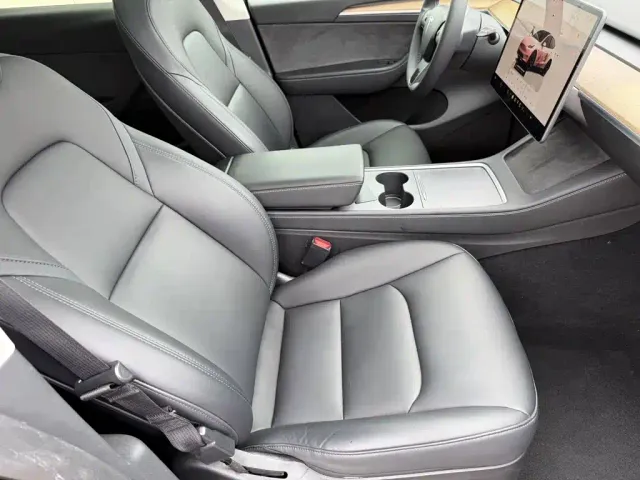 Tesla Model Y — Фото автомобиля 8