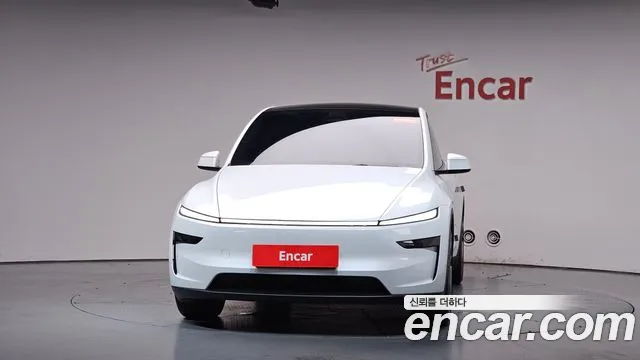 Tesla Model Y — Фото автомобиля 3
