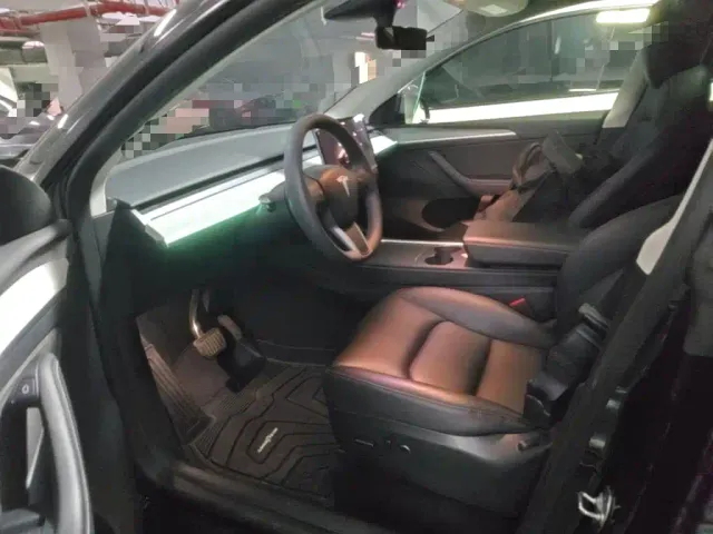 Tesla Model Y — Фото автомобиля 14