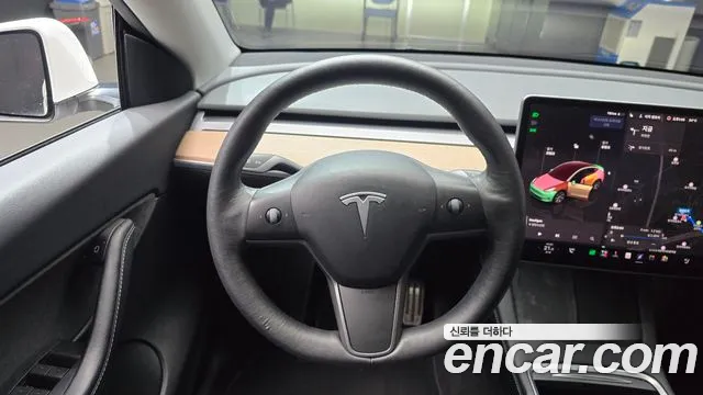 Tesla Model Y — Фото автомобиля 19