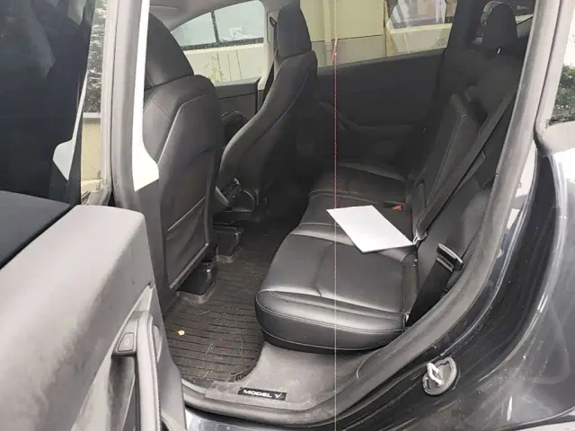 Tesla Model Y — Фото автомобиля 16