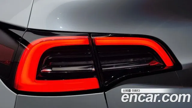 Tesla Model Y — Фото автомобиля 8