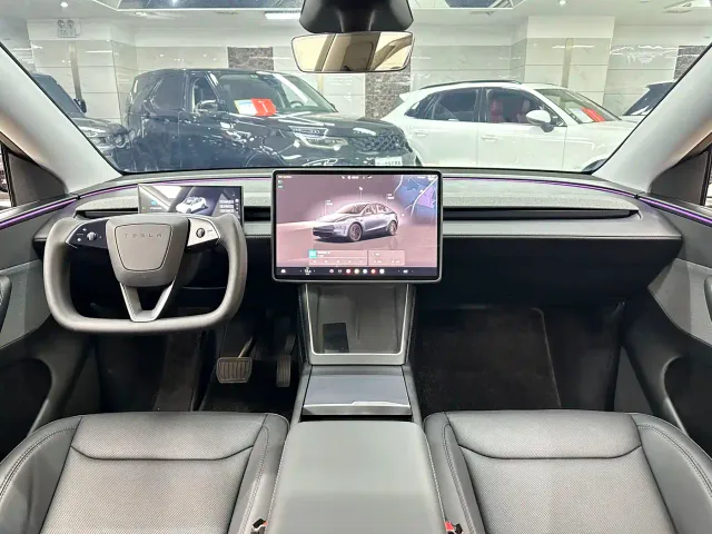 Tesla Model Y — Фото автомобиля 12