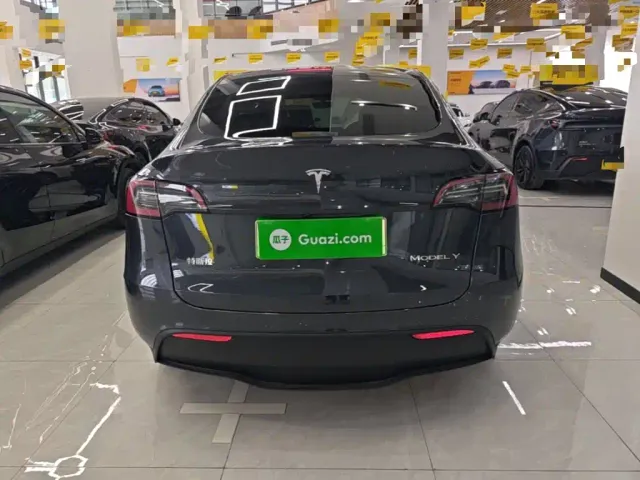 Tesla Model Y — Фото автомобиля 5