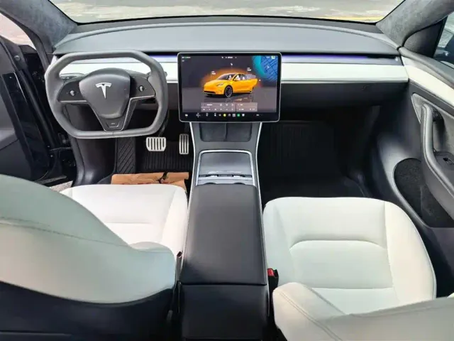 Tesla Model Y — Фото автомобиля 3