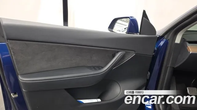 Tesla Model Y — Фото автомобиля 13