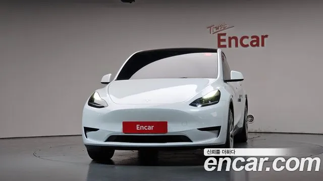 Tesla Model Y — Фото автомобиля 3