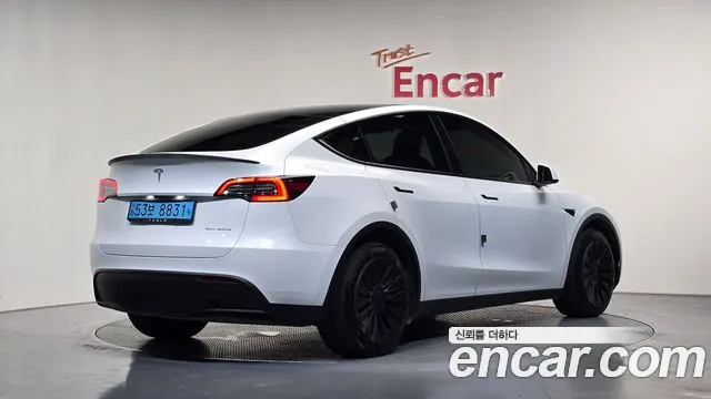 Tesla Model Y — Фото автомобиля 2