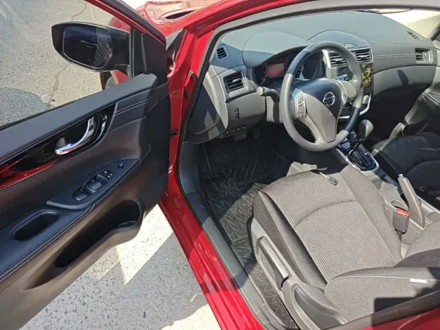 Nissan Tiida — Фото автомобиля 15