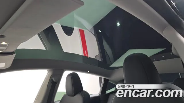 Tesla Model Y — Фото автомобиля 19