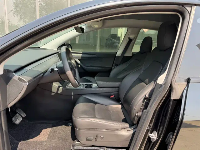 Tesla Model Y — Фото автомобиля 6