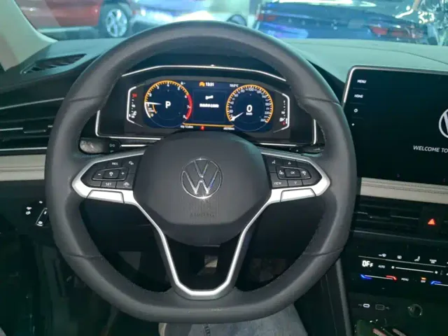 Volkswagen Tiguan L — Фото автомобиля 10