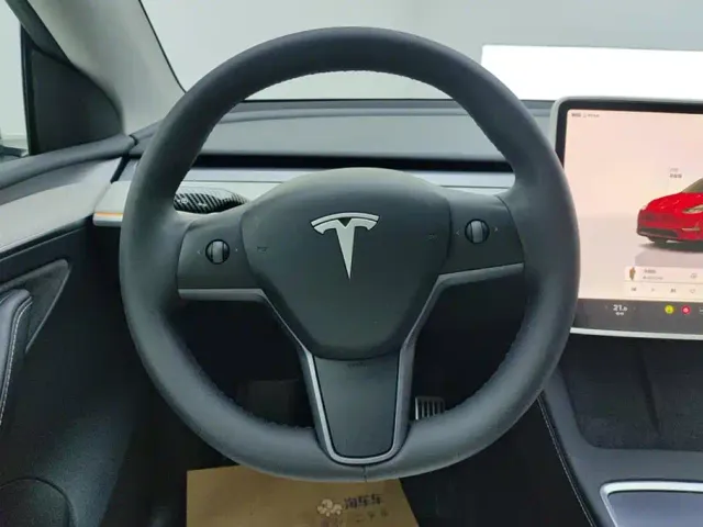Tesla Model Y — Фото автомобиля 15