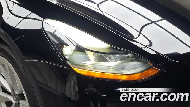 Tesla Model 3 — Фото автомобиля 7