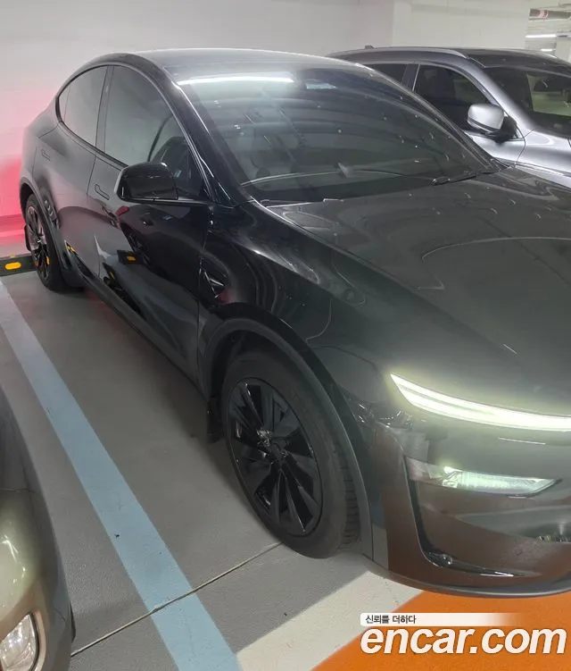Tesla Model Y — Фото автомобиля 5