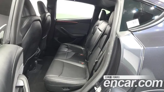 Tesla Model Y — Фото автомобиля 26