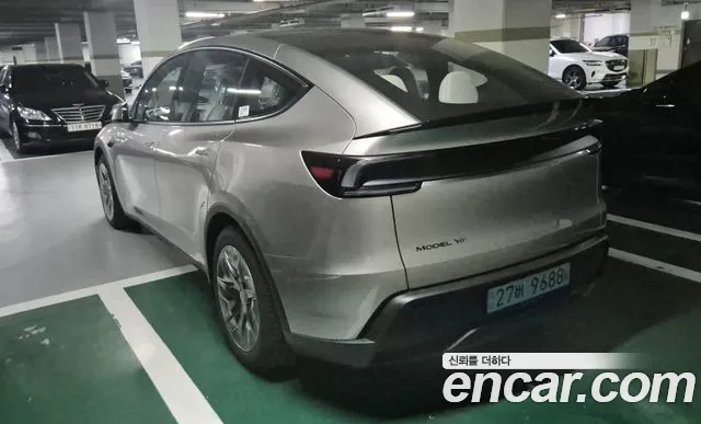 Tesla Model Y — Фото автомобиля 4