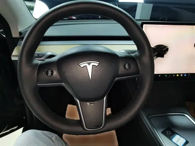Tesla Model Y — Фото автомобиля 6