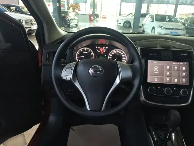 Nissan Tiida — Фото автомобиля 10