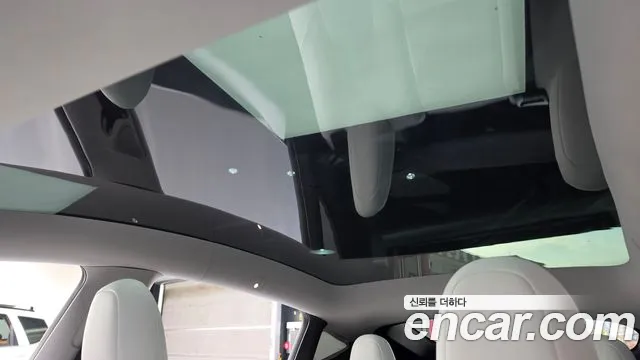 Tesla Model Y — Фото автомобиля 25