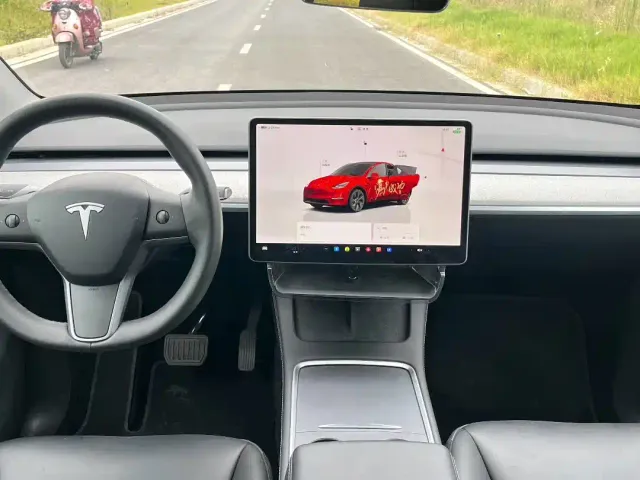 Tesla Model Y — Фото автомобиля 5