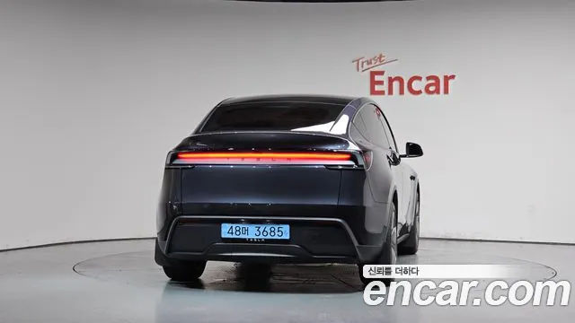 Tesla Model Y — Фото автомобиля 4