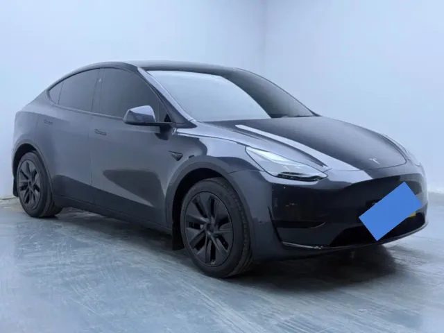 Tesla Model Y — Фото автомобиля 5
