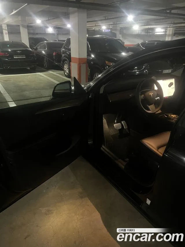 Tesla Model Y — Фото автомобиля 10