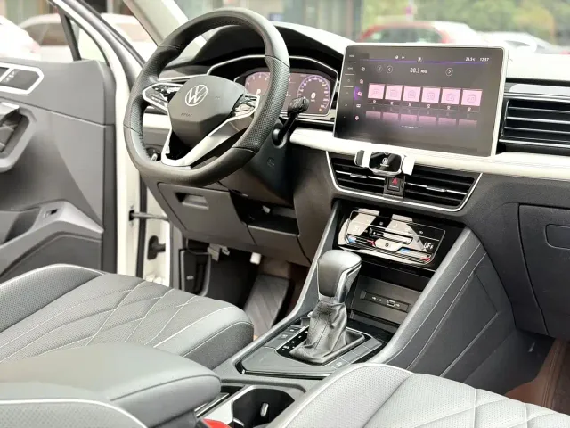 Volkswagen Tiguan L — Фото автомобиля 7
