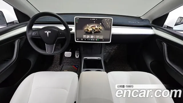 Tesla Model Y — Фото автомобиля 9