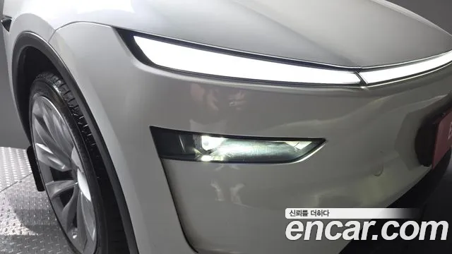 Tesla Model Y — Фото автомобиля 7