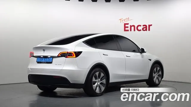 Tesla Model Y — Фото автомобиля 2