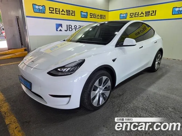 Tesla Model Y — Фото автомобиля 2