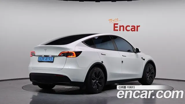 Tesla Model Y — Фото автомобиля 2