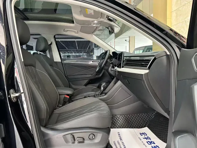 Volkswagen Tiguan L — Фото автомобиля 11