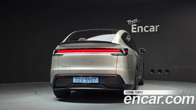 Tesla Model Y — Фото автомобиля 4