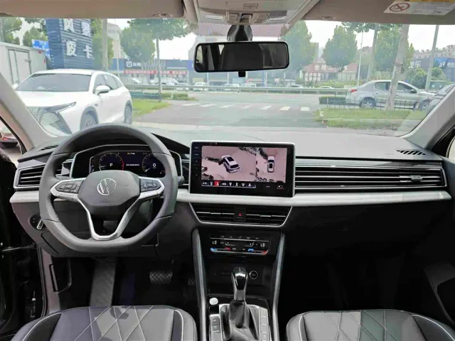 Volkswagen Tiguan L — Фото автомобиля 13