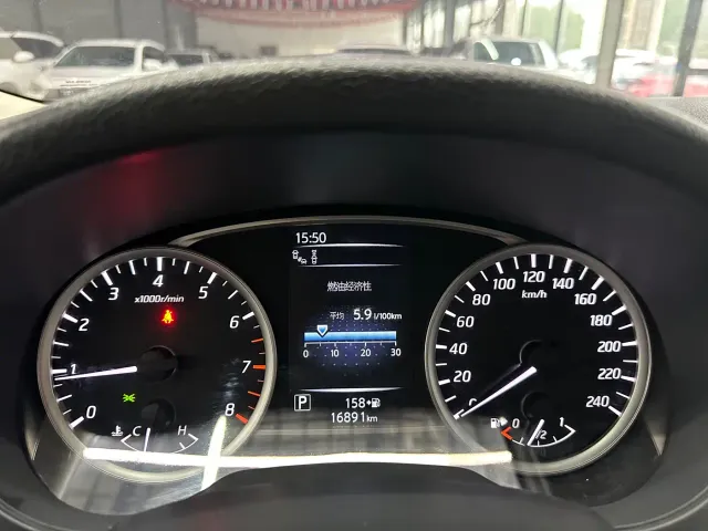 Nissan Tiida — Фото автомобиля 15